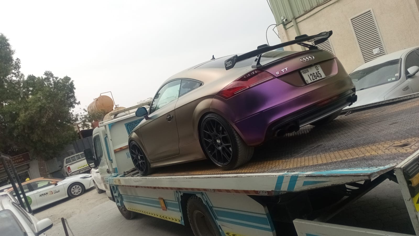 Irfan Recovery Sharjah flatbed truck carrying industrial equipment